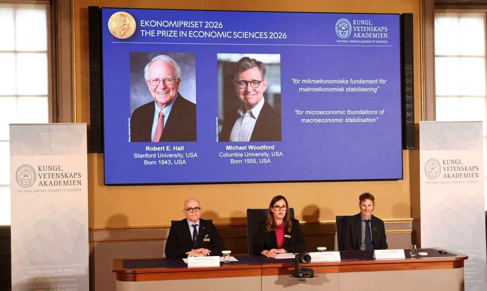 Robert E. Hall and Michael Woodford are announced as the laureates of the 2026 Sveriges Riksbank Prize in Economic Sciences in Memory of Alfred Nobel at the Royal Swedish Academy of Sciences in Stockholm, Sweden, October 12, 2026. (Reuters)