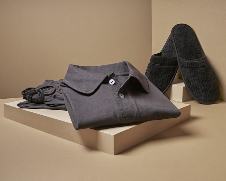Newly developed 100 per cent cotton sleeper suits and coral fleece slippers with improved padding are available for SIA's suites and first class passengers. (Photo: Singapore Airlines)