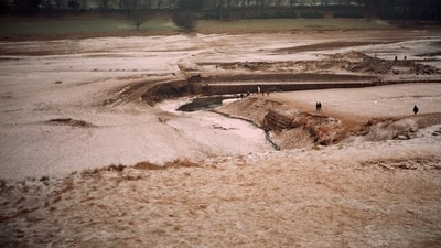 The remains of Derwent village emerge from beneath Ladybower Reservoir as water levels fall. (Wikimedia Commons.)