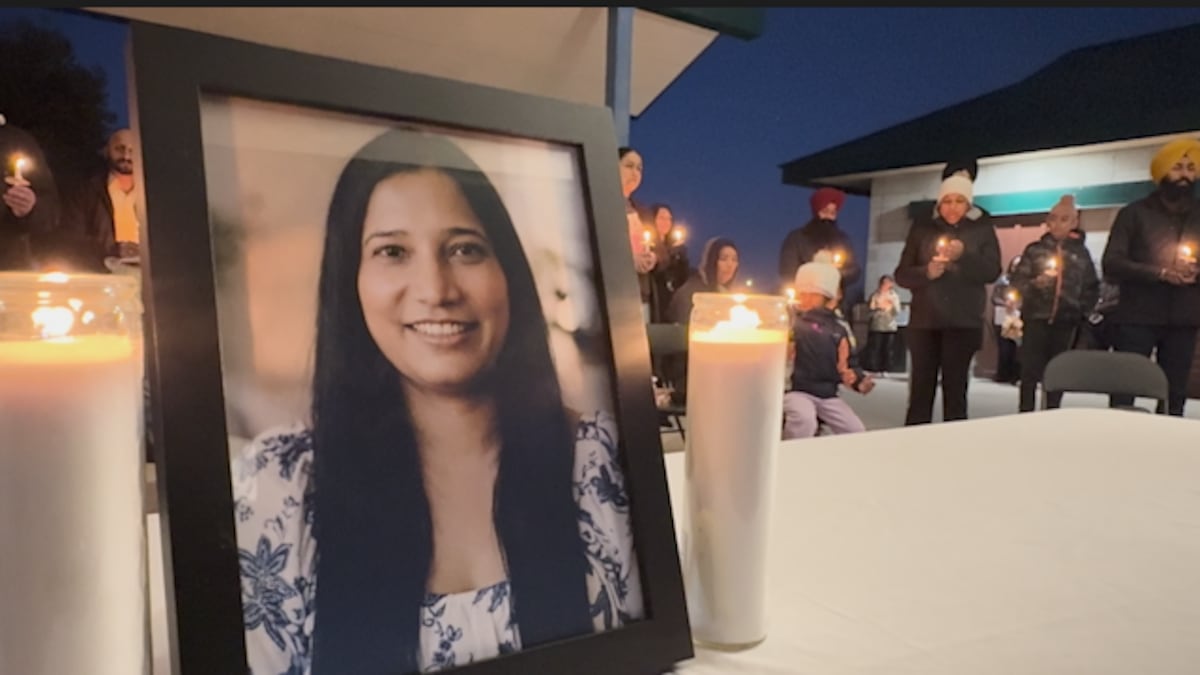 London community gathers to remember Raman Devi at candlelight vigil